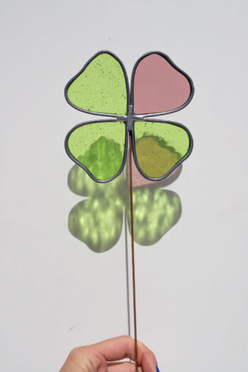Stained glass four-leaf clover suncatcher on spike for plant pot or garden
