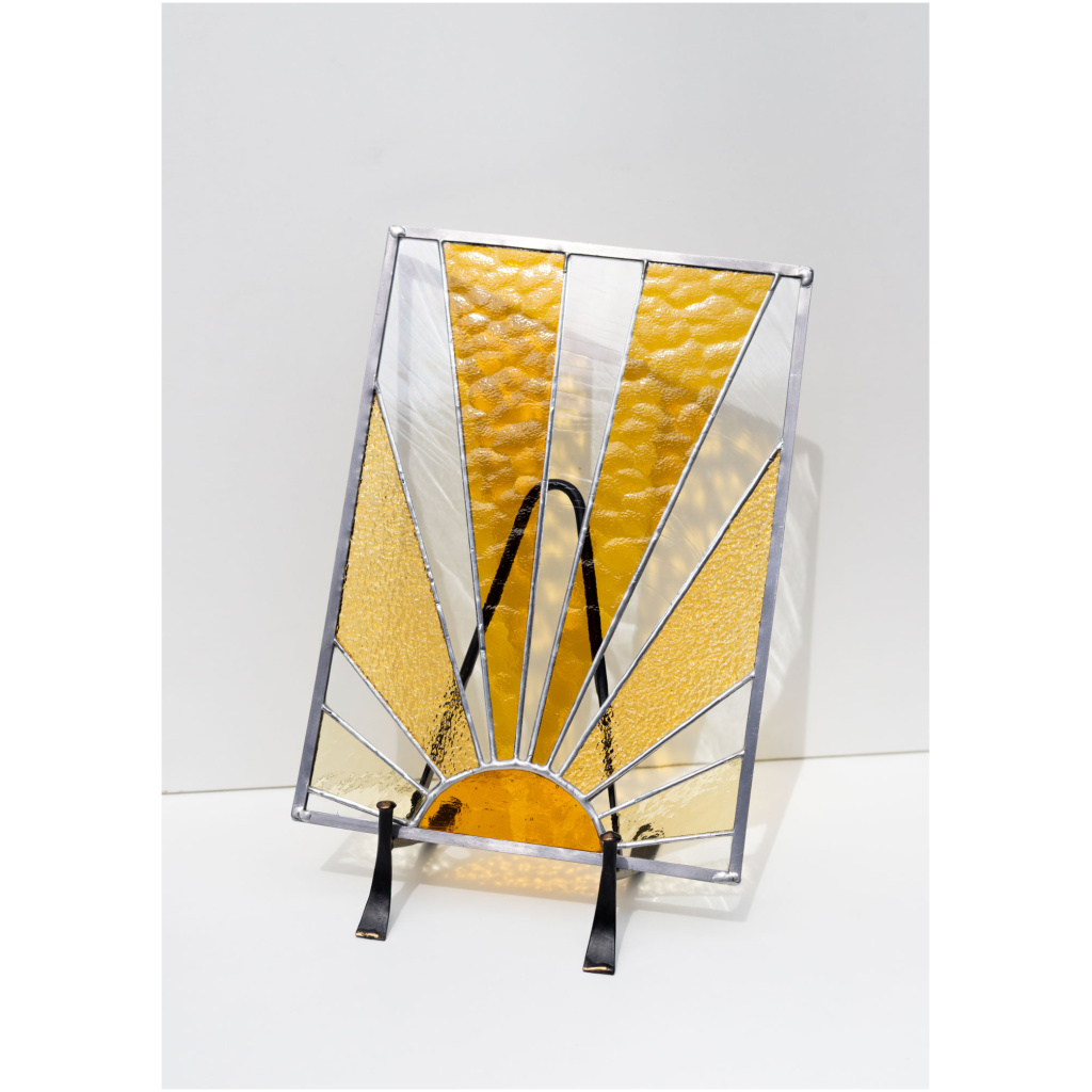 Decorative stained glass panel inspired by the sun, handmade art glass
