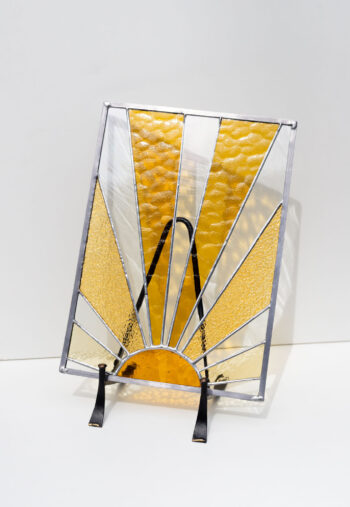Decorative stained glass panel inspired by the sun, handmade art glass