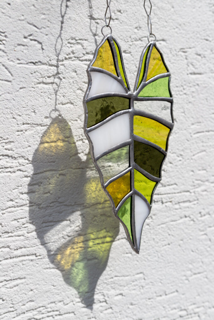 Handmade stained glass suncatcher with alocasia plant design, hanging window decoration