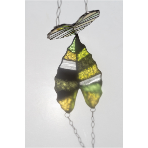 Handmade stained glass suncatcher with alocasia plant design, hanging window decoration