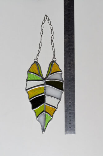 Handmade stained glass suncatcher with alocasia plant design, hanging window decoration