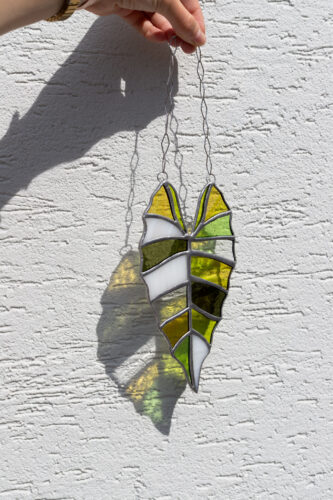 Handmade stained glass suncatcher with alocasia plant design, hanging window decoration