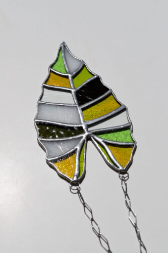Handmade stained glass suncatcher with alocasia plant design, hanging window decoration