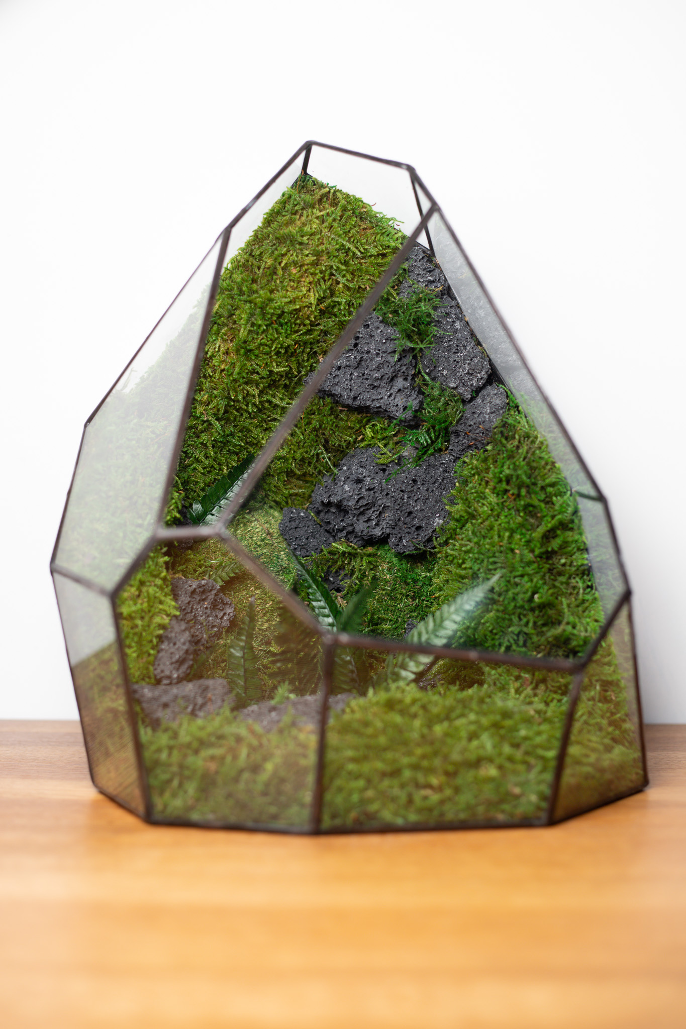 Low Maintenance Glass Drop terrarium by DuosGlass displayed in modern interior, no care plant decor.