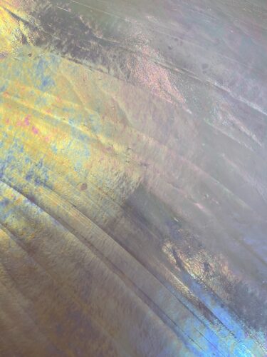 Selection of colorful raw glass sheets for custom glass art and decor