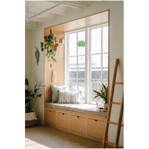 Hanging stained glass window suncatcher in a lotus flower shape made with Tiffany technique.